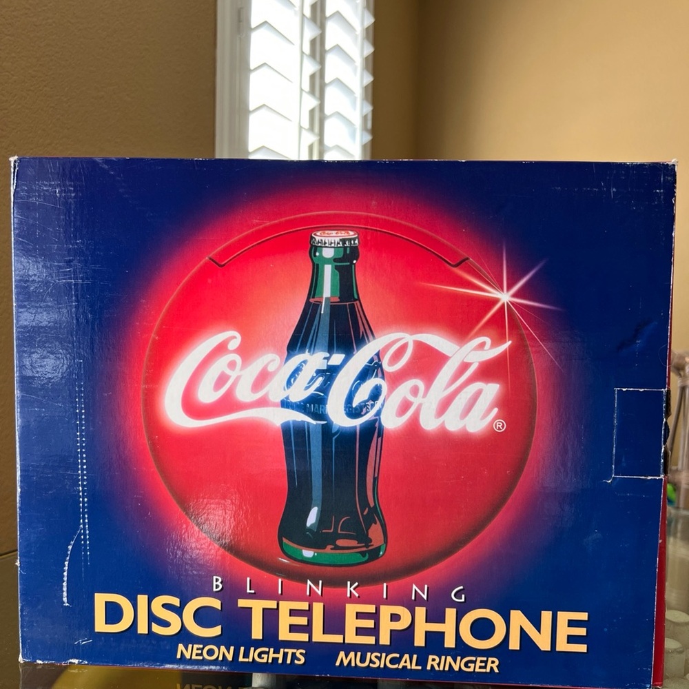 Coca-Cola Neon Disc Telephone with Red and Blue Design